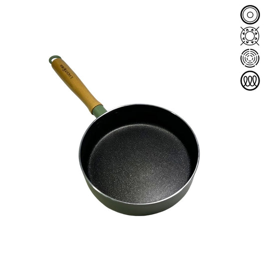Green saucepan with a wooden handle and smooth enamel finish, placed on a white background